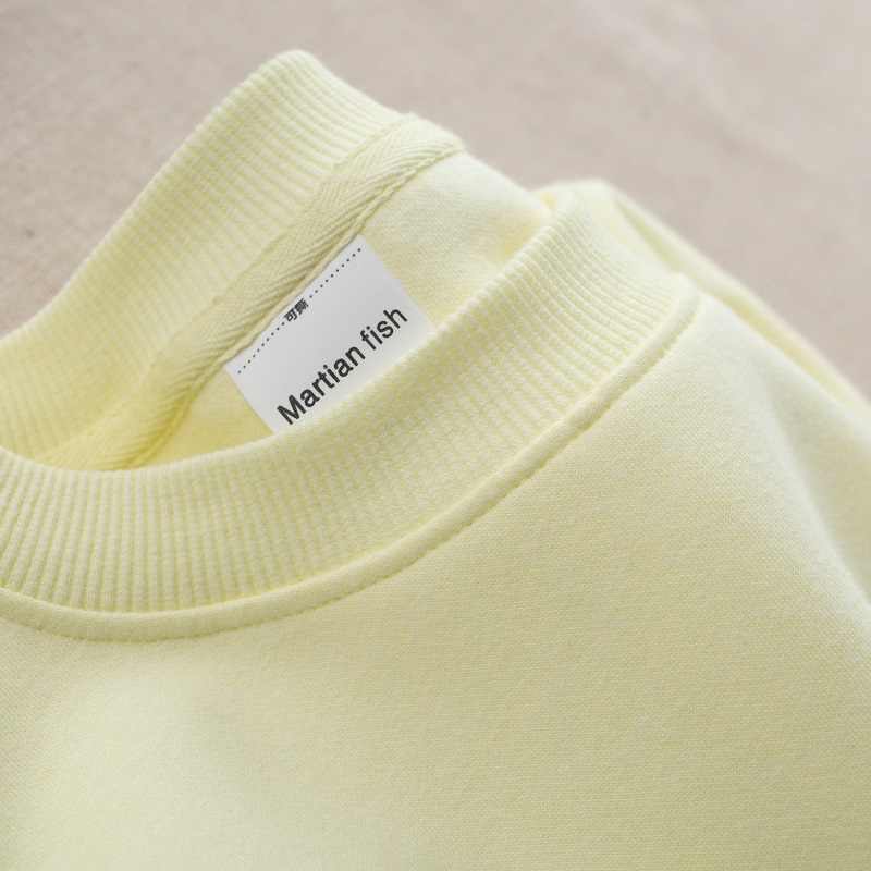 Pull col rond jaune pâle femme